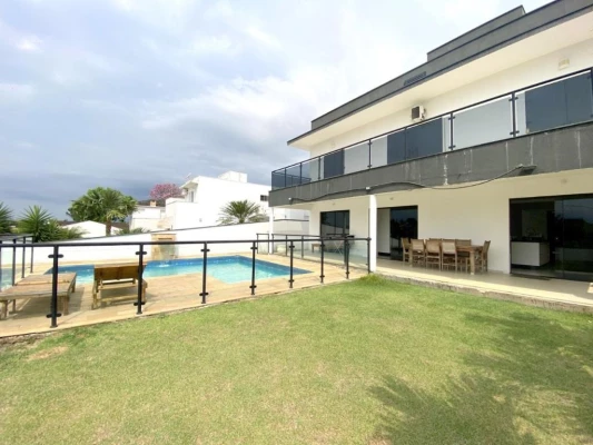 Foto 1: Sobrado com 3 dormitórios à venda, 318 m² por R$ 1.200.000,00 - Condomínio Portal do Sol - Tremembé/SP